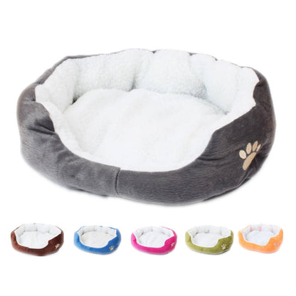 CozyNest Plush Oval Pet Bed with Paw Embroidery
